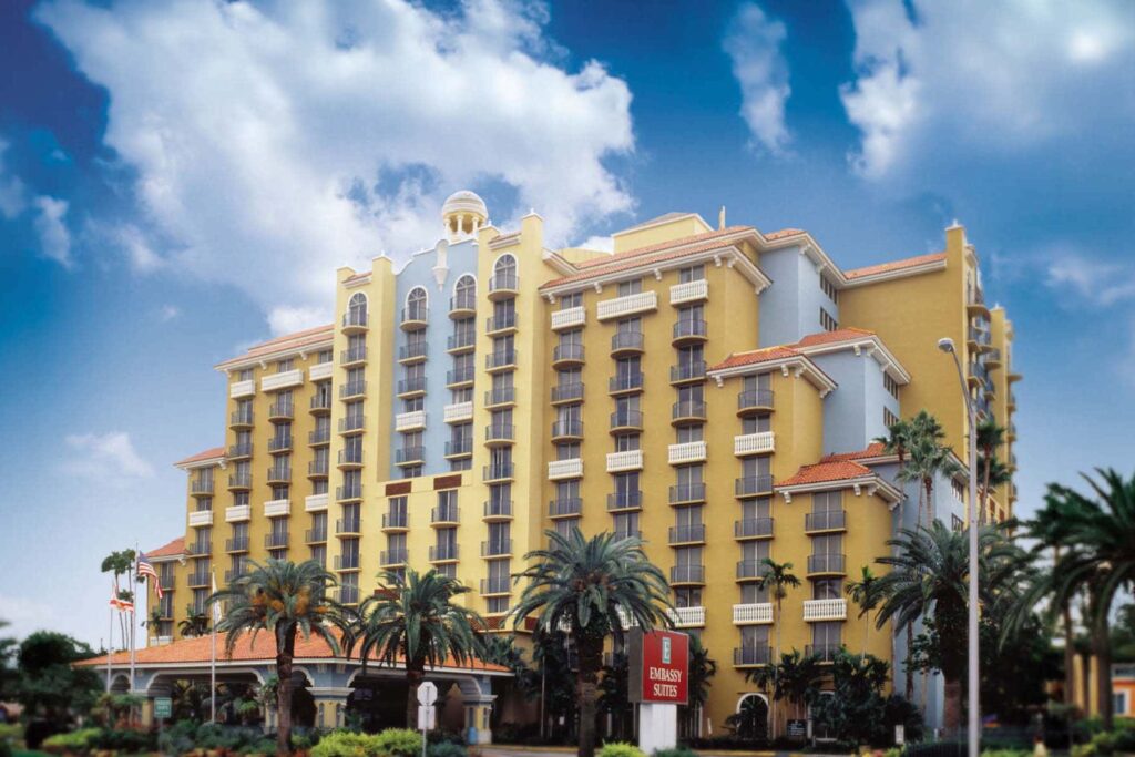 The exterior of a high-rise hotel building, representing SageWater’s hospitality piping replacement services.